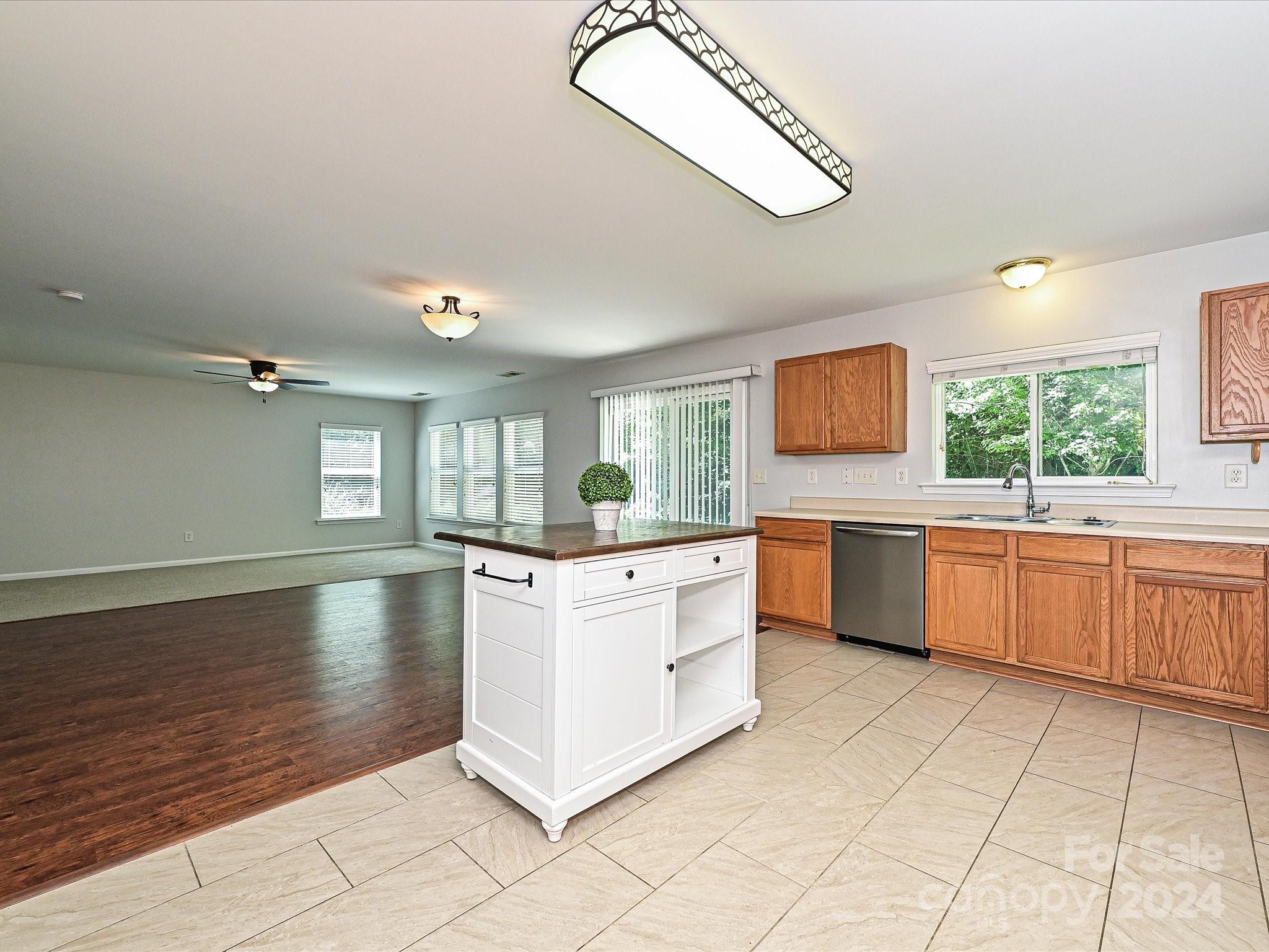 796 Ivy Trail Way Fort Mill, SC 29715 - Photo 13 of 39 a large white kitchen with a large window