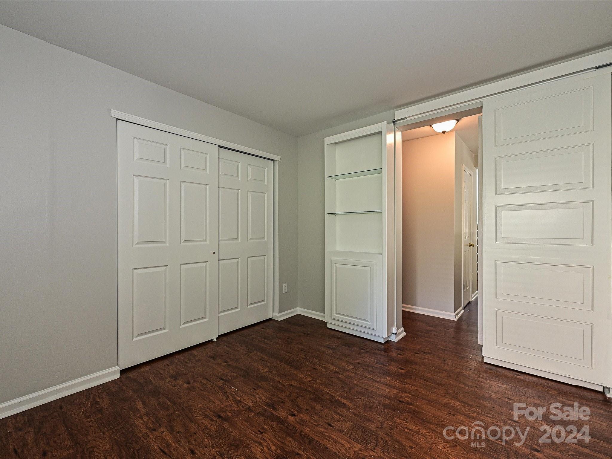 796 Ivy Trail Way Fort Mill, SC 29715 - Photo 19 of 39 an empty room with wooden floor & closet area