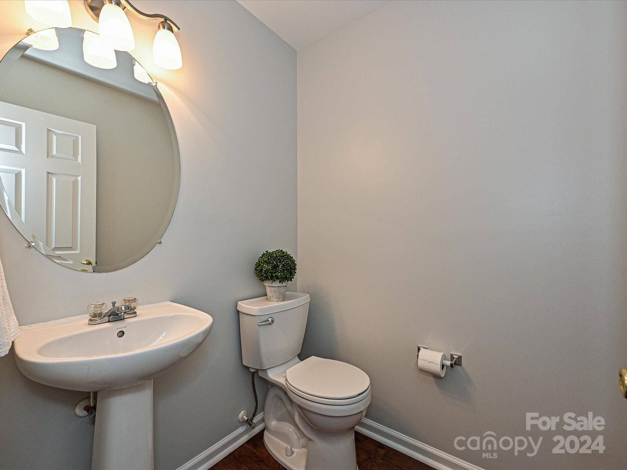796 Ivy Trail Way Fort Mill, SC 29715 - Photo 20 of 39 a bathroom with a toilet sink and mirror