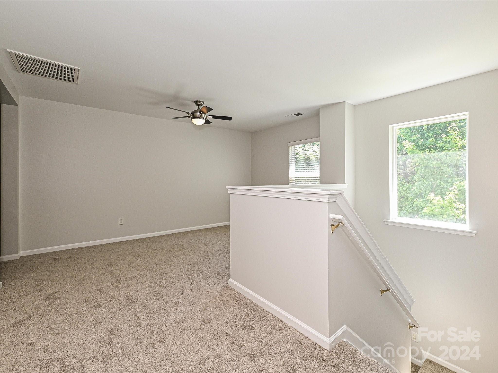 796 Ivy Trail Way Fort Mill, SC 29715 - Photo 21 of 39 a view of an empty room with a window
