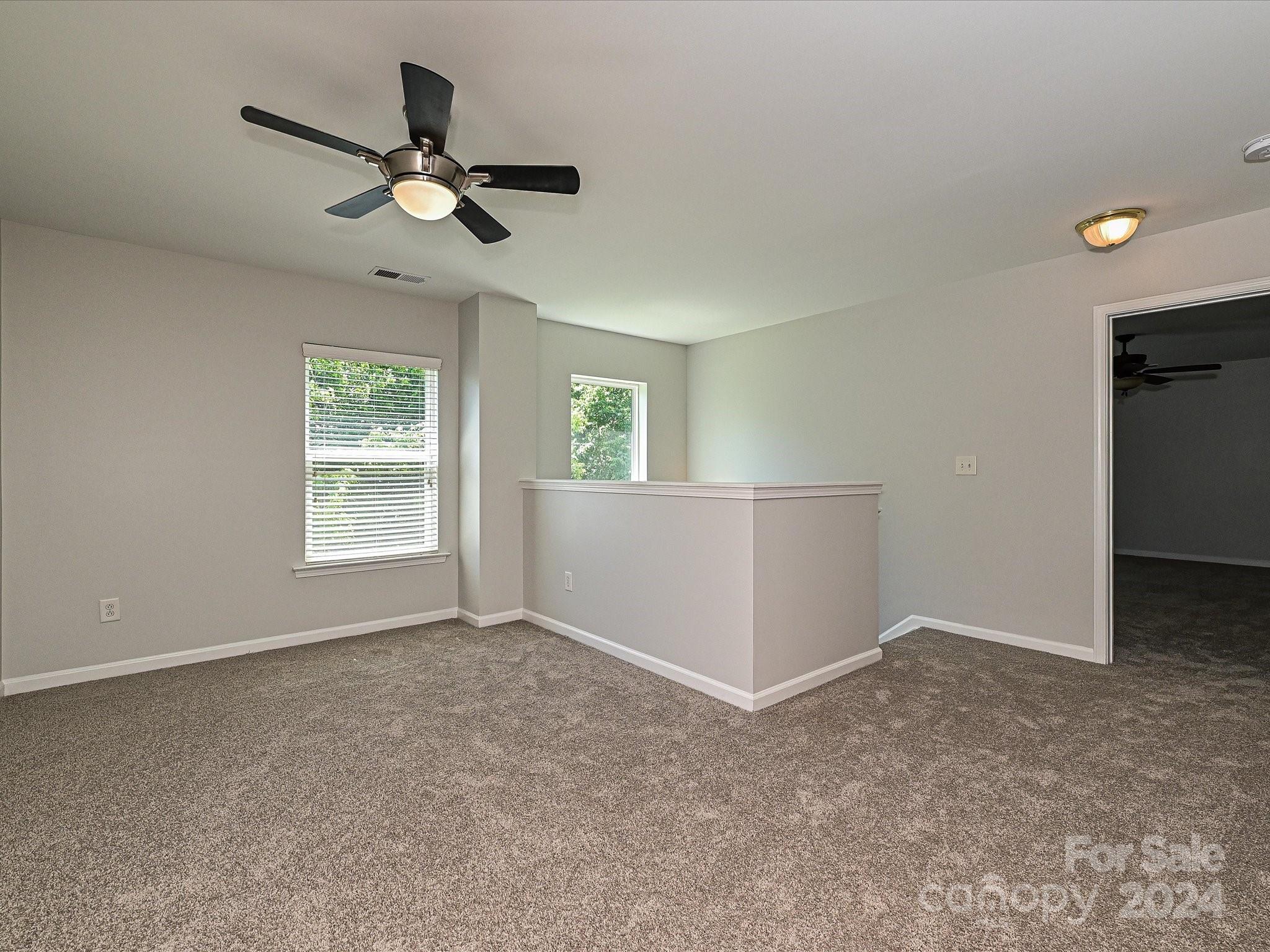 796 Ivy Trail Way Fort Mill, SC 29715 - Photo 22 of 39 a view of an empty room with a window