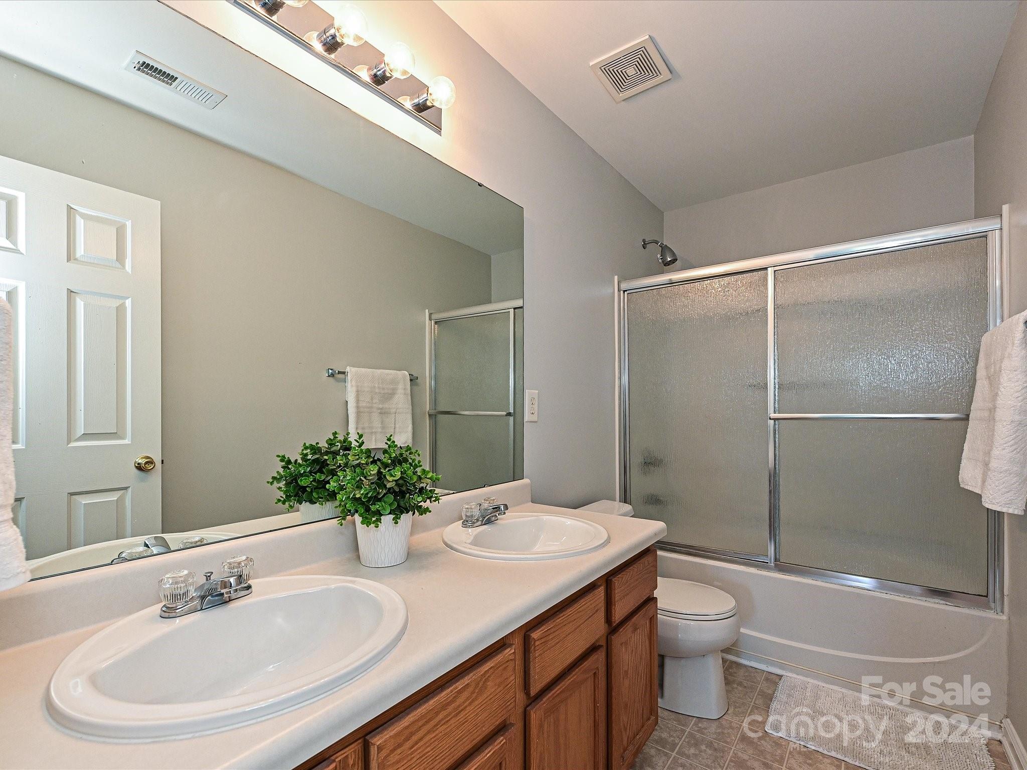 796 Ivy Trail Way Fort Mill, SC 29715 - Photo 30 of 39 a bathroom with a sink toilet and shower