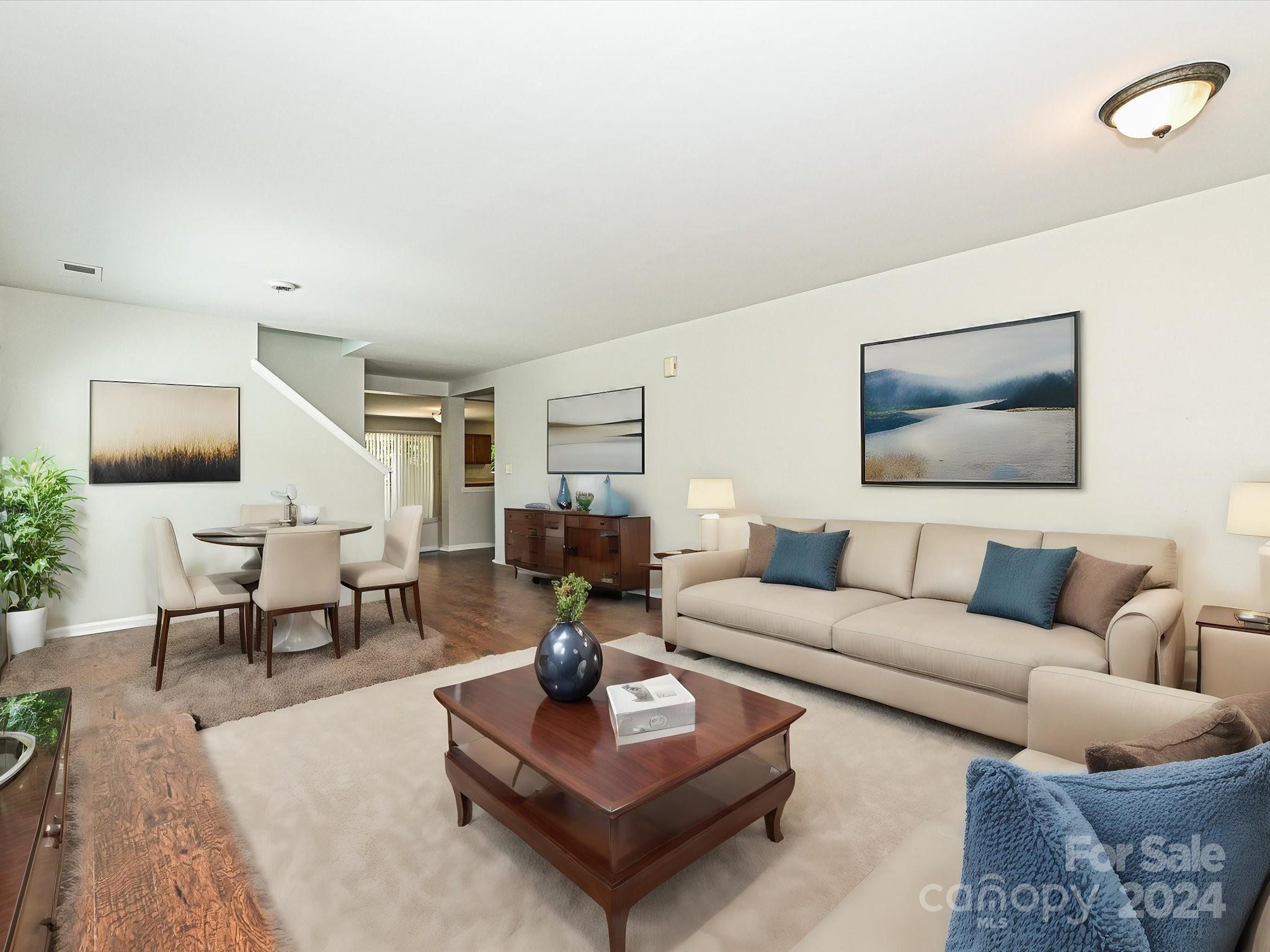 796 Ivy Trail Way Fort Mill, SC 29715 - Photo 6 of 39 a living room with furniture a rug and a lamp
