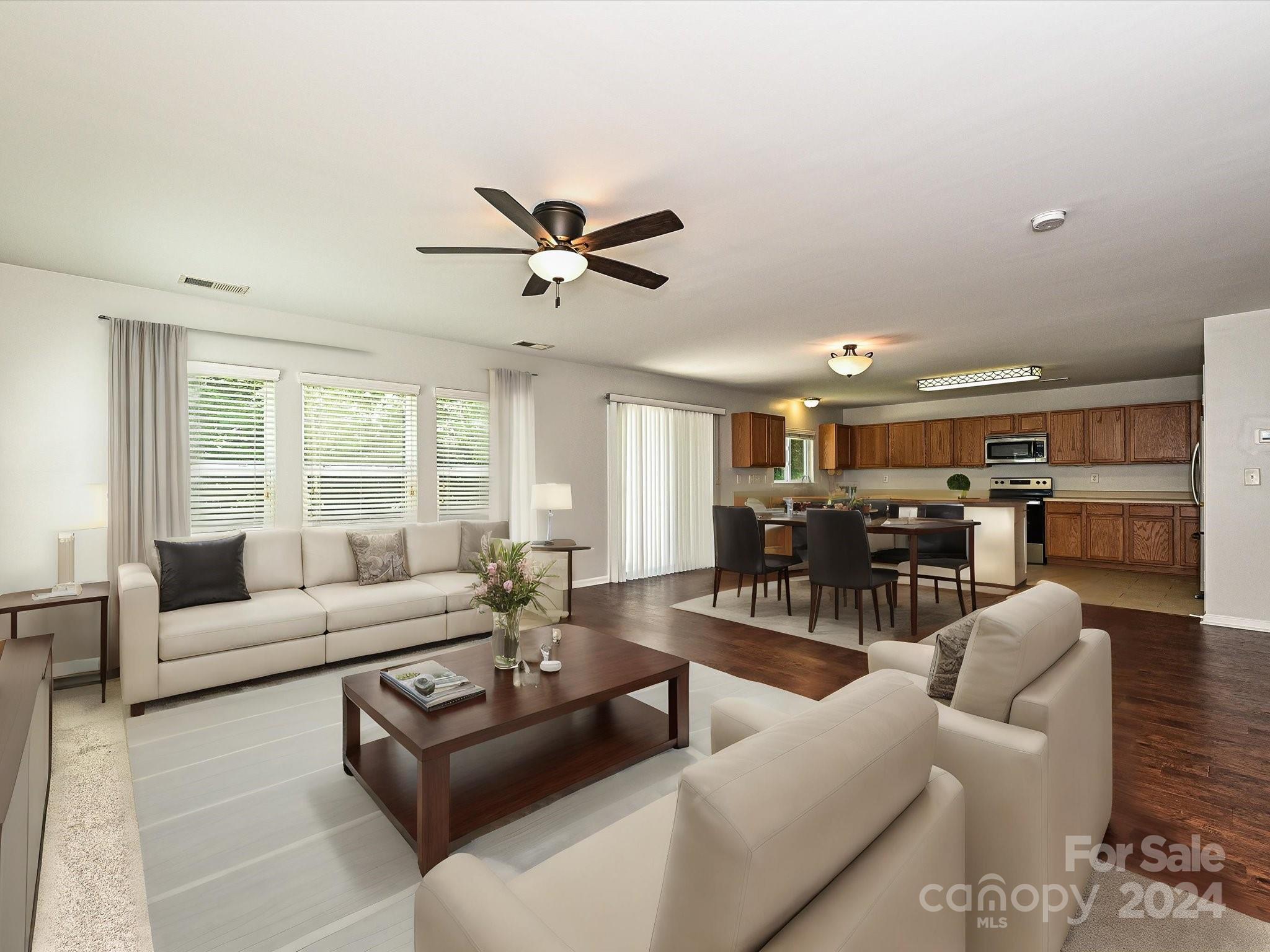 796 Ivy Trail Way Fort Mill, SC 29715 - Photo 8 of 39 a living room with furniture and a large window