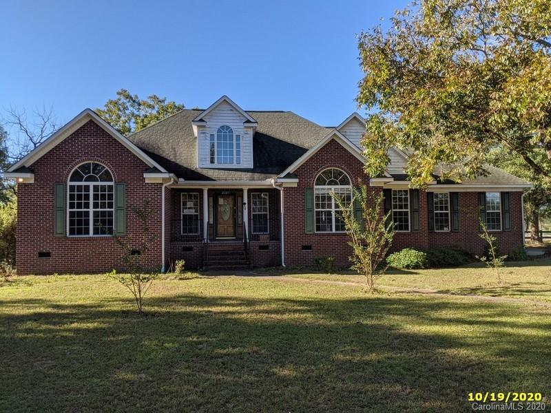 2227 Ridgeway Road Lugoff, SC 29078 - Photo 2 of 12 a view of a house with a swimming pool