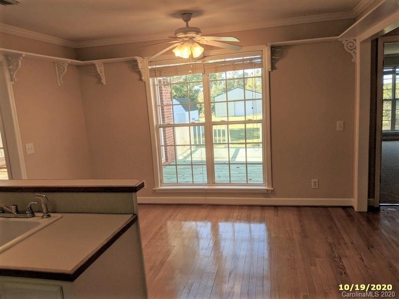 2227 Ridgeway Road Lugoff, SC 29078 - Photo 6 of 12 a view of a room with wooden floor and a window