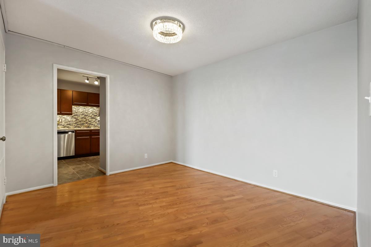 5902 Mt Eagle Drive, Unit 1503 Alexandria, VA 22303 - Photo 11 of 30 Dining Room - View Towards Kitchen Entry