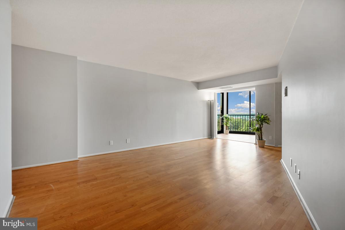 5902 Mt Eagle Drive, Unit 1503 Alexandria, VA 22303 - Photo 6 of 30 Living Room - View from Dining Room to Sun Room