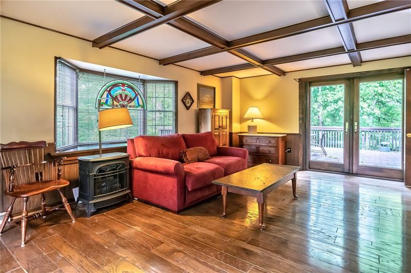 144 Berwyn Road Pittsburgh, PA 15237 - Photo 11 of 25 Family room offers bay window overlooking the wooded yard and Anderson French doors leading to the extensive deck.