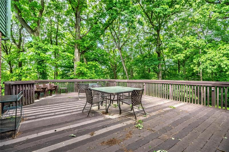 144 Berwyn Road Pittsburgh, PA 15237 - Photo 22 of 25 Oversized Trex Deck overlooking your private wooded setting. Stairs to patio beneath and partially finished walk out basement.
