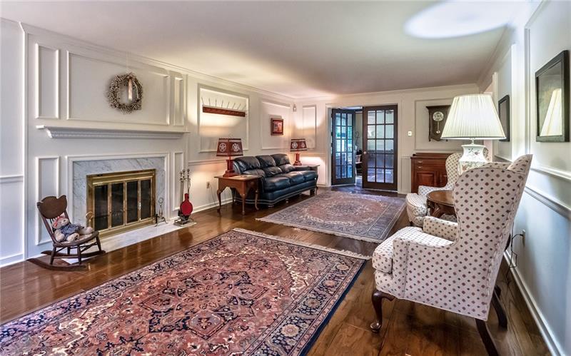 144 Berwyn Road Pittsburgh, PA 15237 - Photo 6 of 25 Beautifully trimmed fireplace with marble surround in the living room, opens in the rear to the family room.