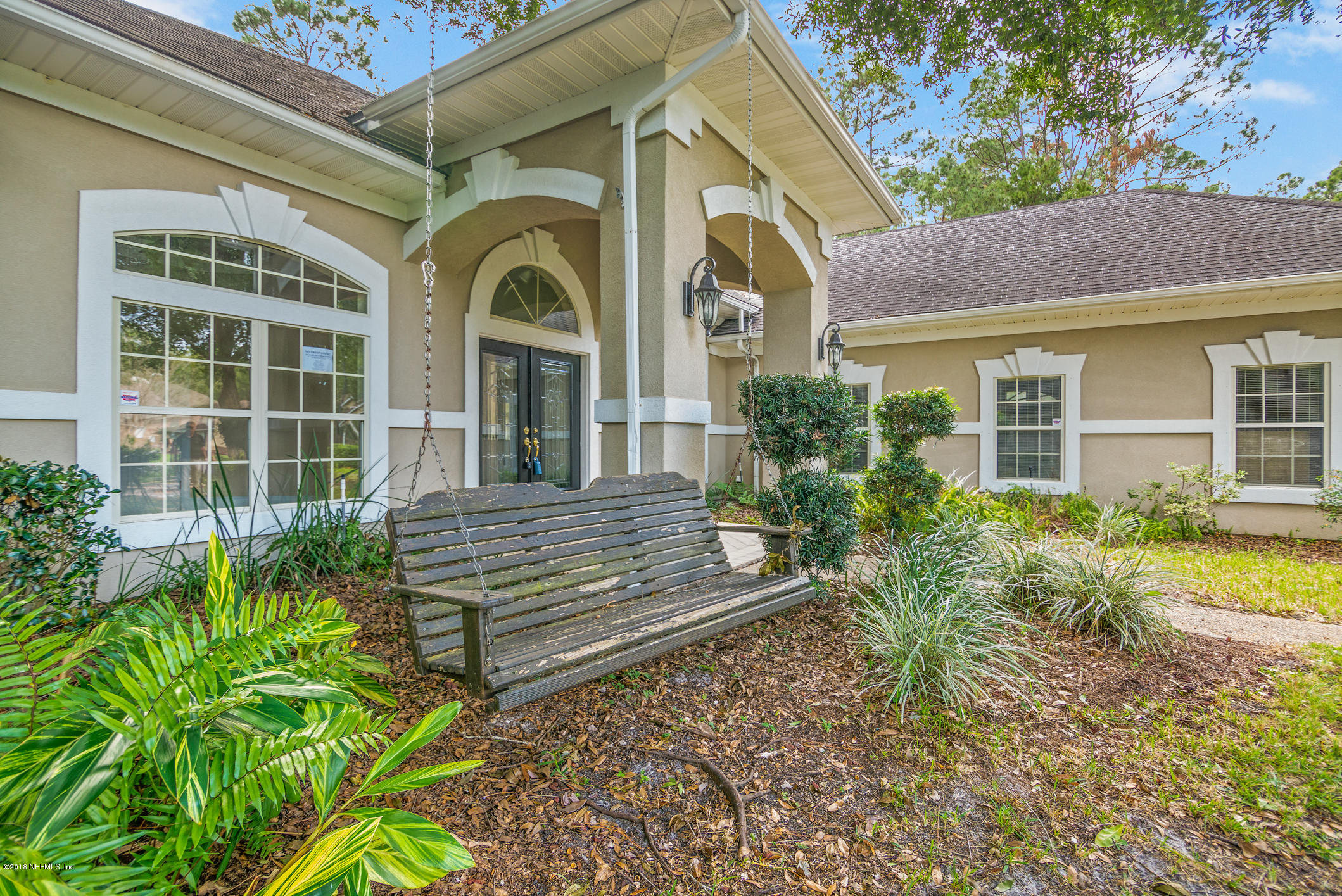 1899 Commodore Point Drive Orange Park, FL 32003 - Photo 14 of 52 a front view of a house with garden