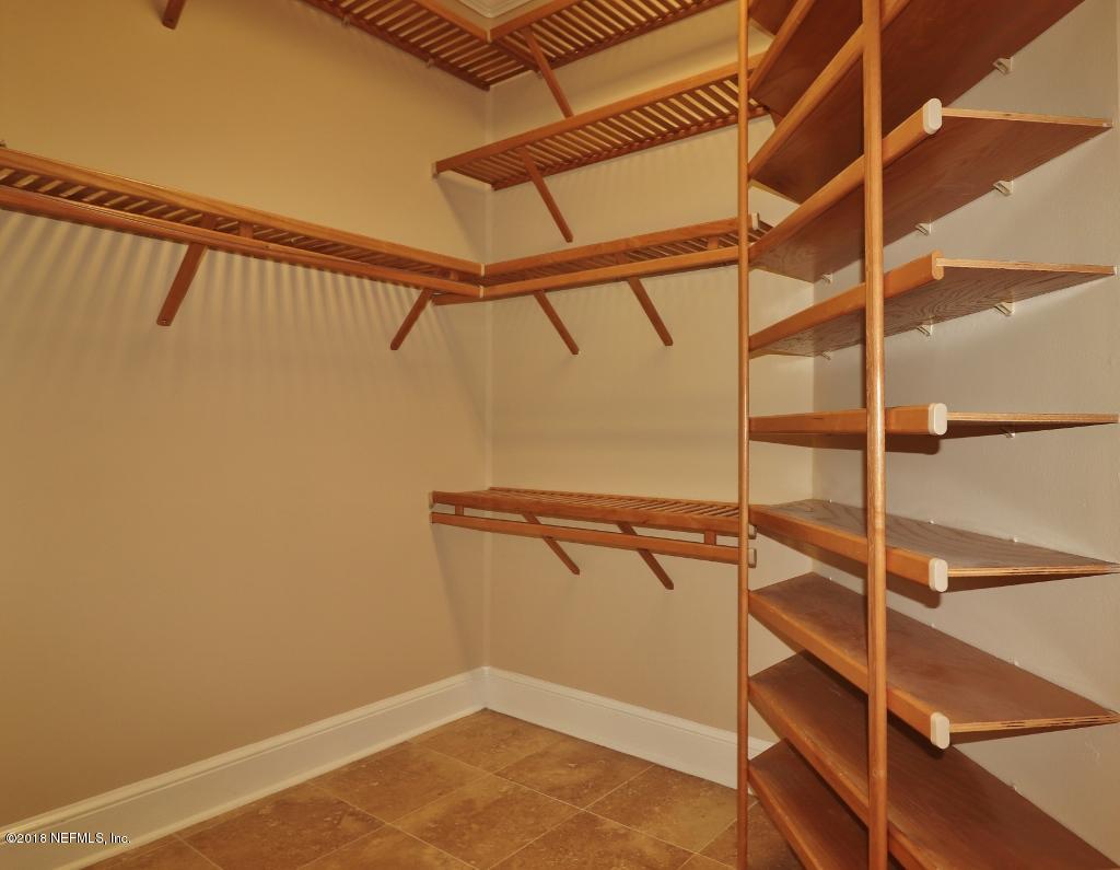1899 Commodore Point Drive Orange Park, FL 32003 - Photo 26 of 52 a view of walk in closet with empty racks