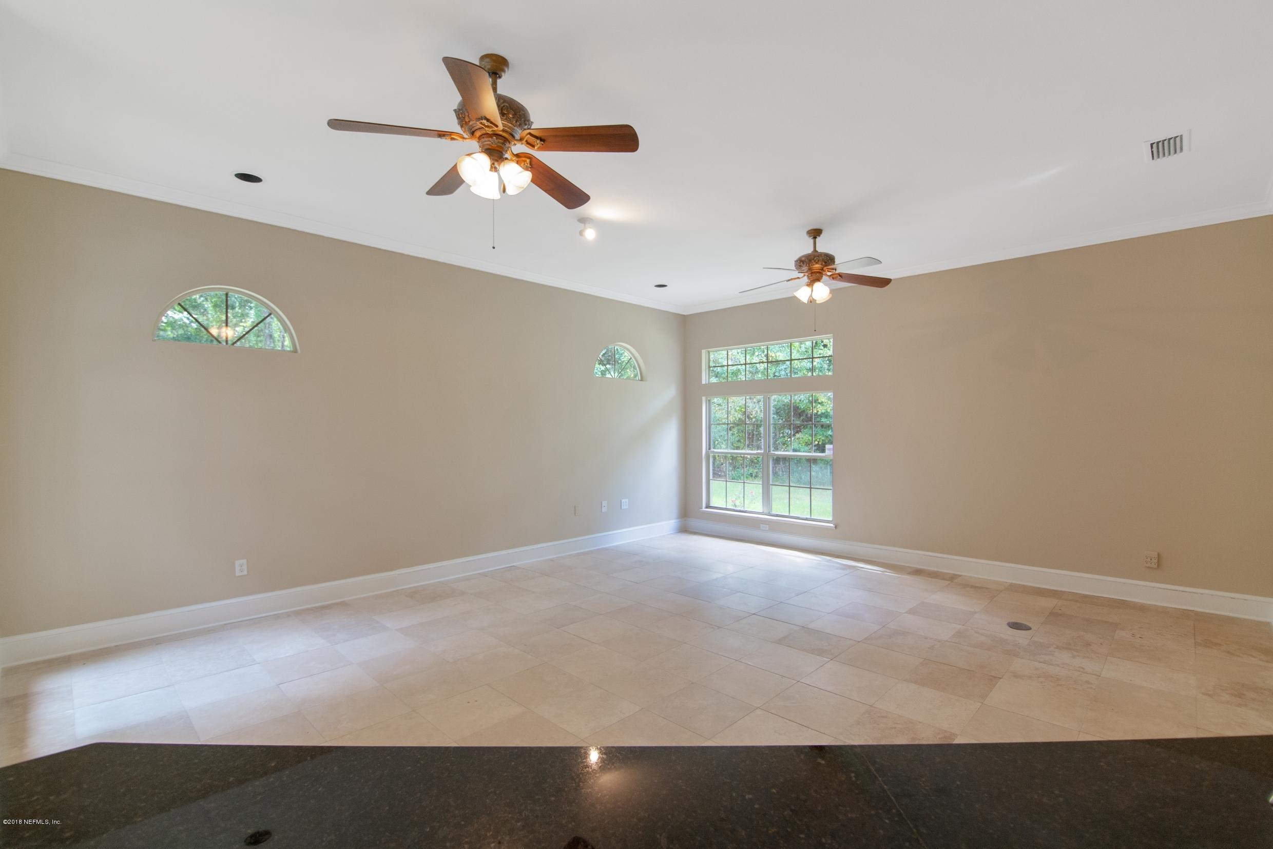 1899 Commodore Point Drive Orange Park, FL 32003 - Photo 42 of 52 a view of an empty room with a window