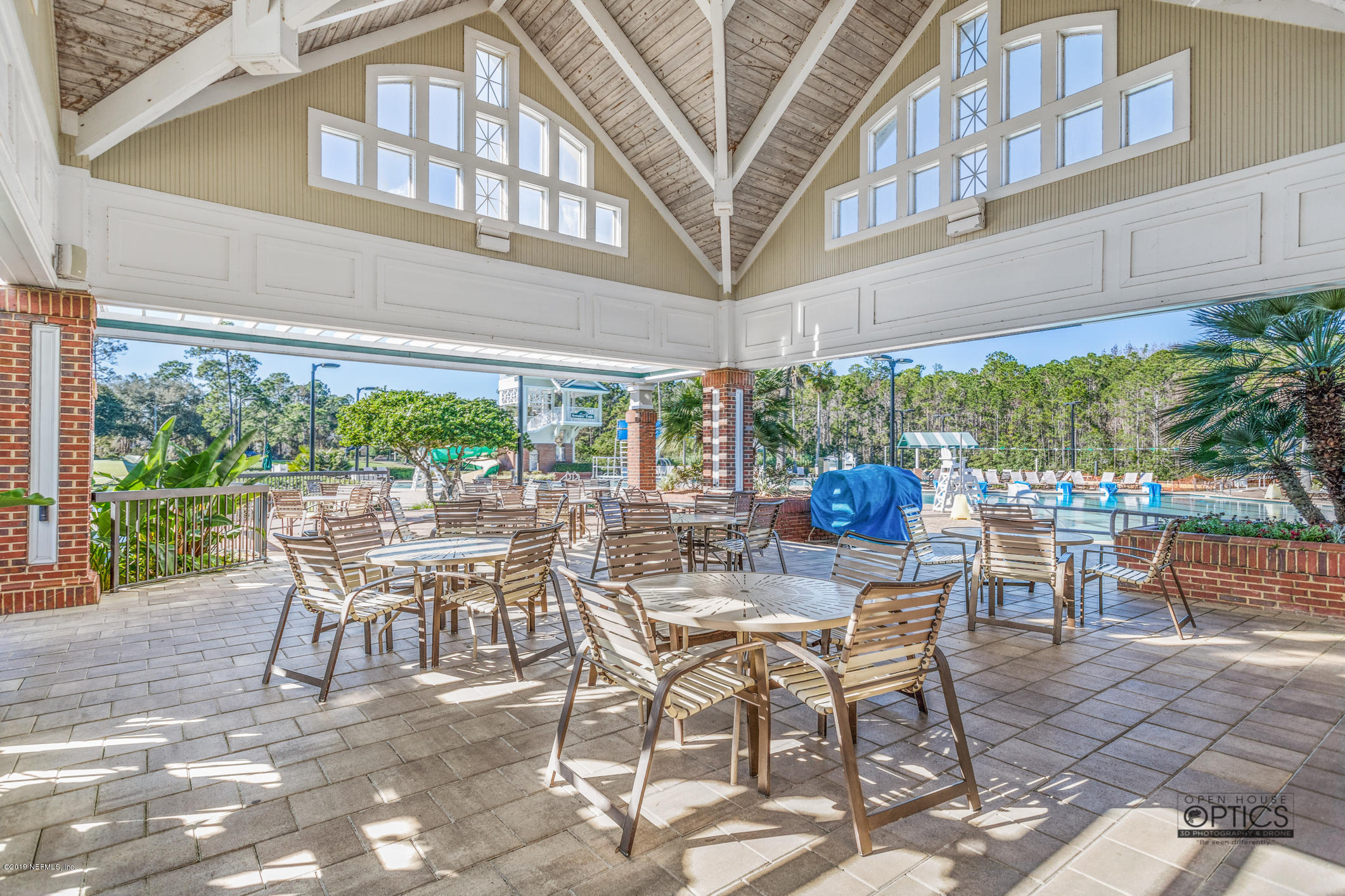 1899 Commodore Point Drive Orange Park, FL 32003 - Photo 45 of 52 a view of a patio with a table and chairs and potted plants