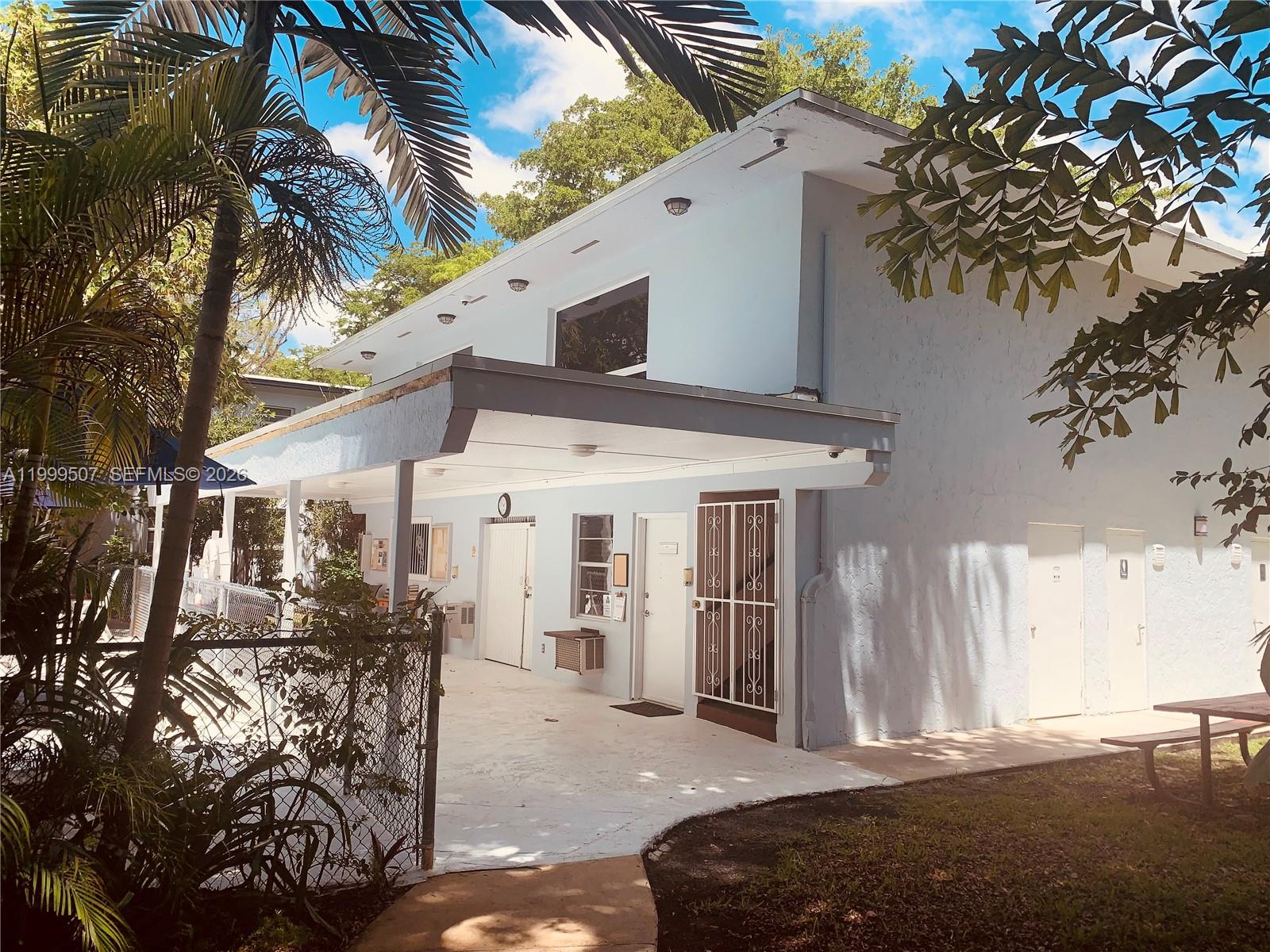 5605 Southwest 80th Street, Unit 97A Miami, FL 33143 - Photo 18 of 25 a view of a house with a patio