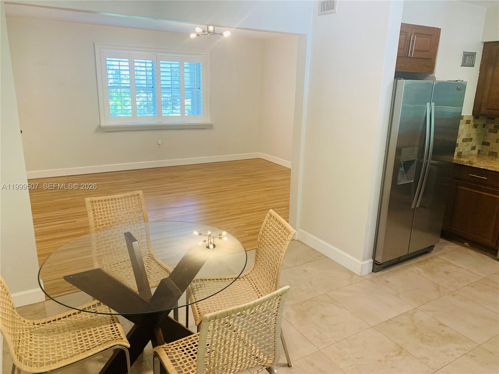 5605 Southwest 80th Street, Unit 97A Miami, FL 33143 - Photo 10 of 25 a view of a livingroom with furniture and a couch