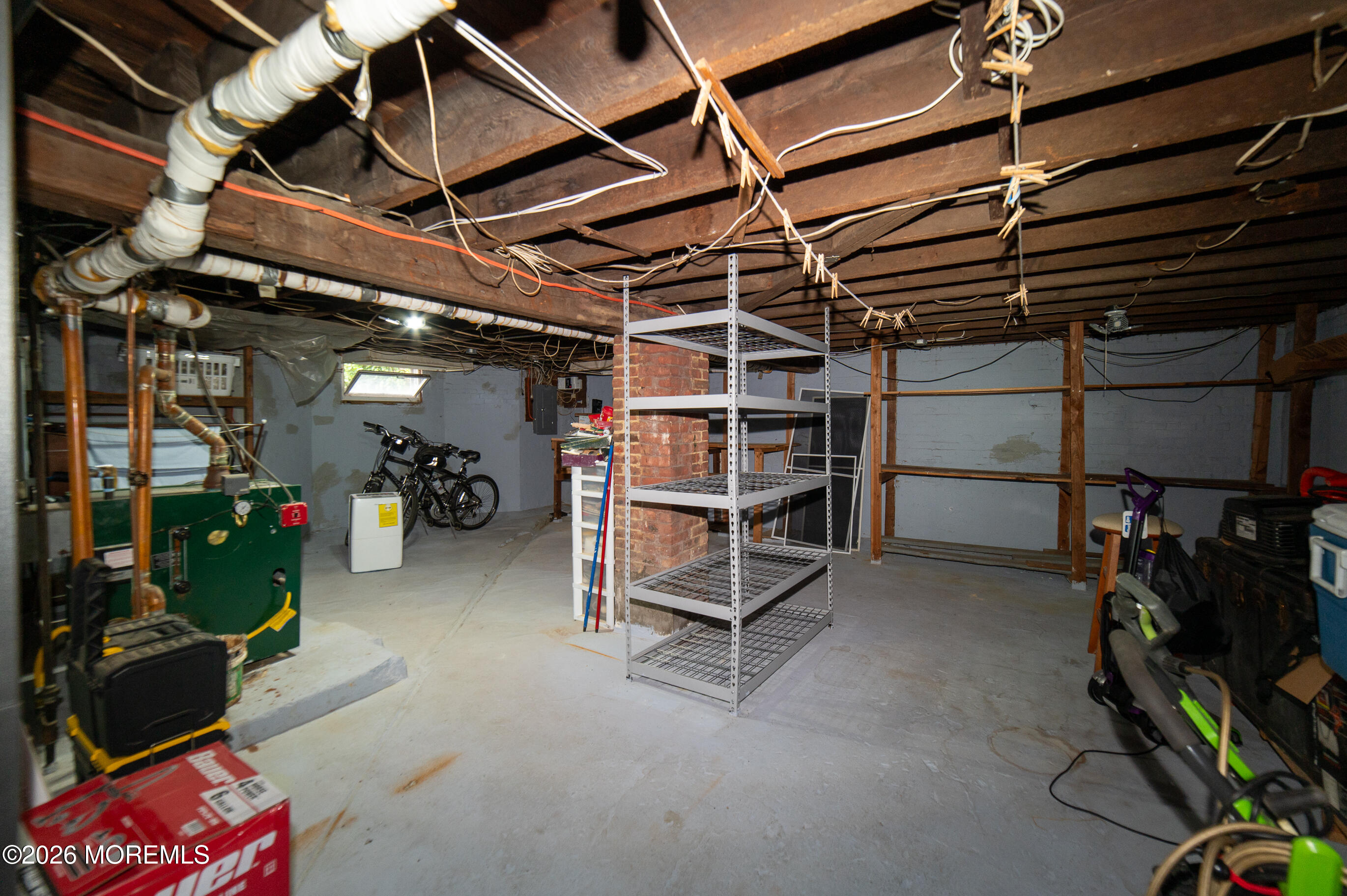 38 Walnut Street Keyport, NJ 07735 - Photo 6 of 19 a view of a storage room with racks