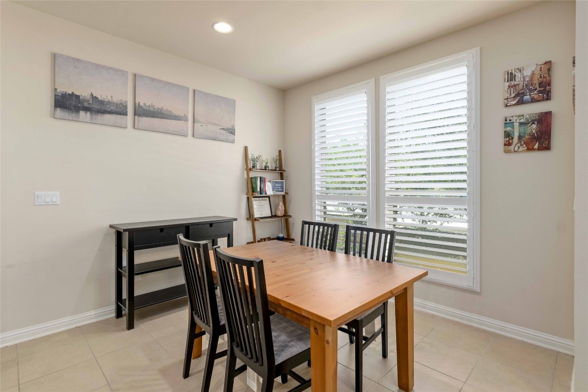 6814 East Riverside Drive, Unit 31 Austin, TX 78741 - Photo 11 of 25 a view of a dining room with furniture and window