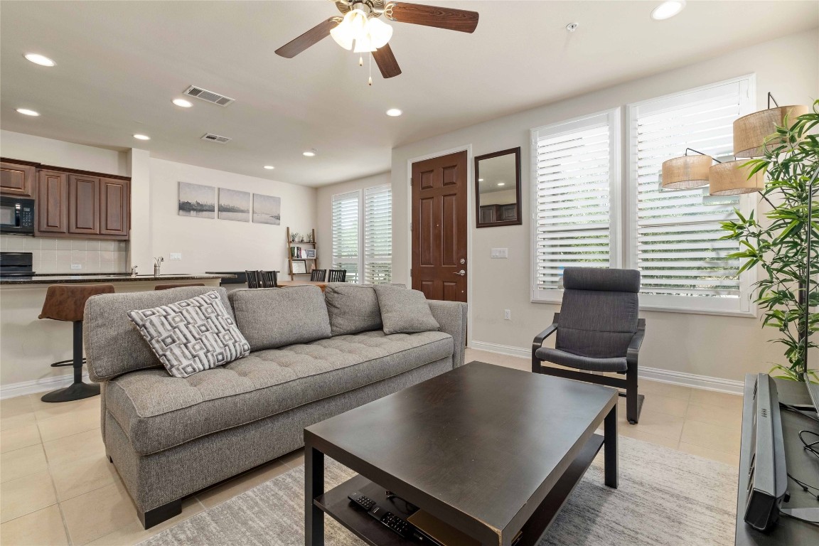 6814 East Riverside Drive, Unit 31 Austin, TX 78741 - Photo 5 of 25 a living room with furniture and a window