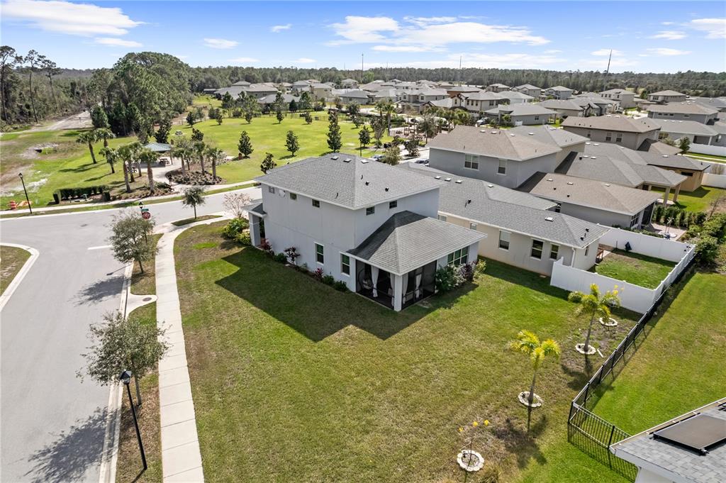 6699 Alder Road St. Cloud, FL 34773 - Photo 2 of 51 aerial view of a house with a yard and lake view