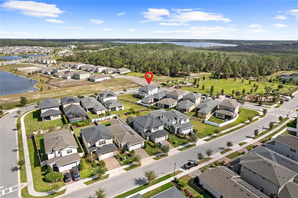 6699 Alder Road St. Cloud, FL 34773 - Photo 32 of 51 an aerial view of residential houses with outdoor space