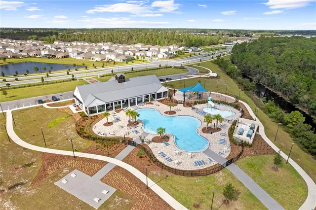 a view of a swimming pool with an ocean view