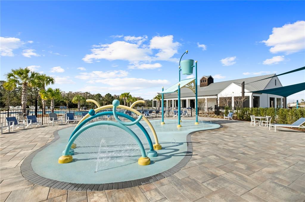 6699 Alder Road St. Cloud, FL 34773 - Photo 40 of 51 a swimming pool with outdoor seating yard and barbeque oven