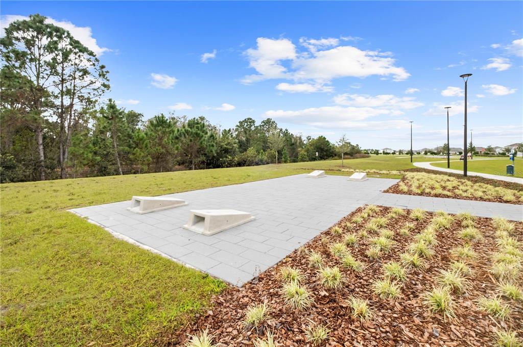 6699 Alder Road St. Cloud, FL 34773 - Photo 43 of 51 a view of a lake and a mountain