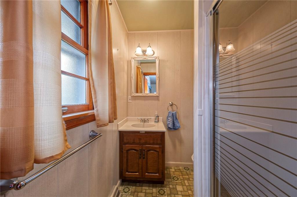 1913 Brigadoon Lane New Castle, PA 16101 - Photo 17 of 30 a bathroom with a sink and a mirror