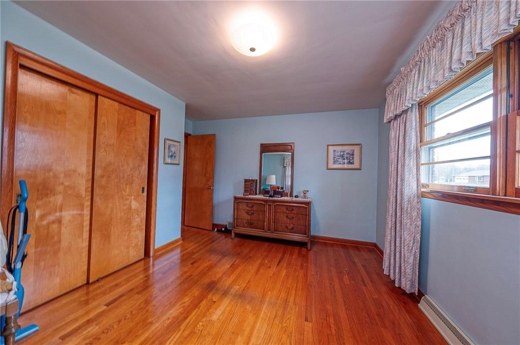 1913 Brigadoon Lane New Castle, PA 16101 - Photo 19 of 30 wooden floor in an empty room with a window