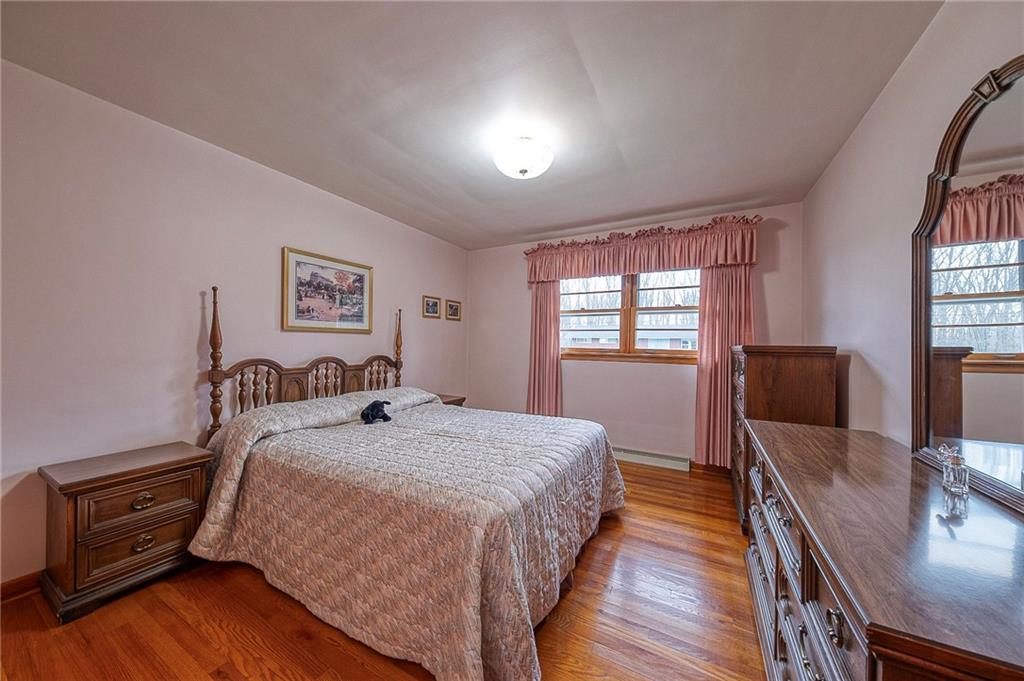 1913 Brigadoon Lane New Castle, PA 16101 - Photo 20 of 30 a bed room with a bed and a chair