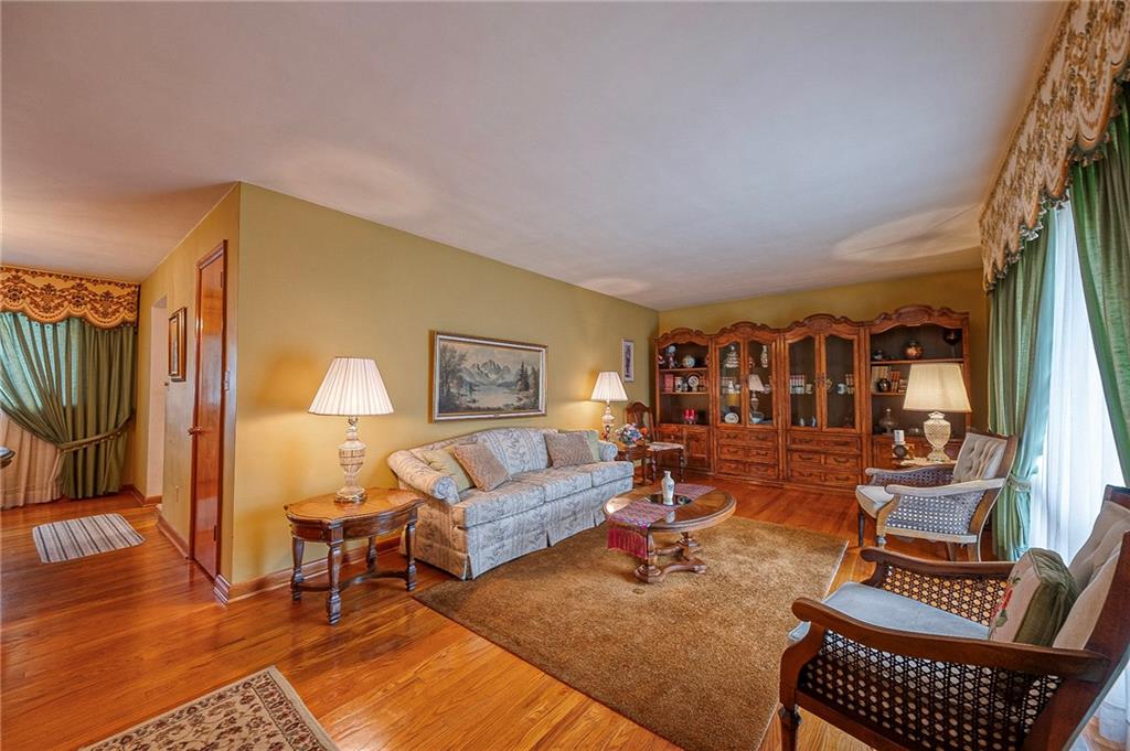 1913 Brigadoon Lane New Castle, PA 16101 - Photo 4 of 30 a living room with furniture a rug and a window