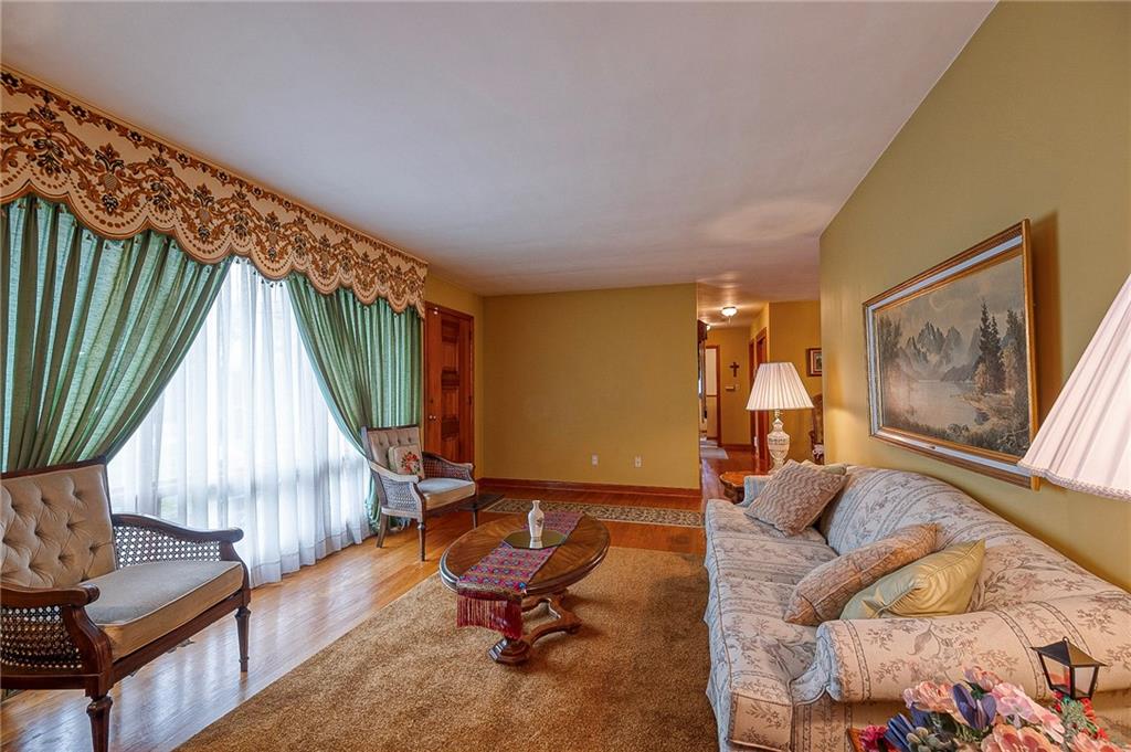 1913 Brigadoon Lane New Castle, PA 16101 - Photo 5 of 30 a living room with furniture and a wooden floor