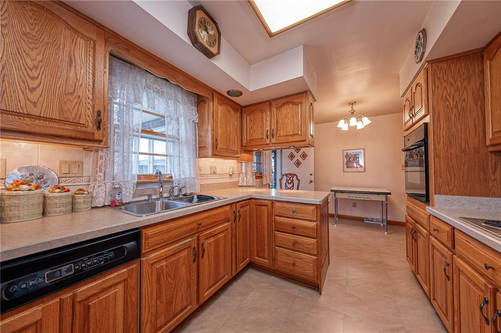 1913 Brigadoon Lane New Castle, PA 16101 - Photo 7 of 30 a kitchen with a sink and cabinets