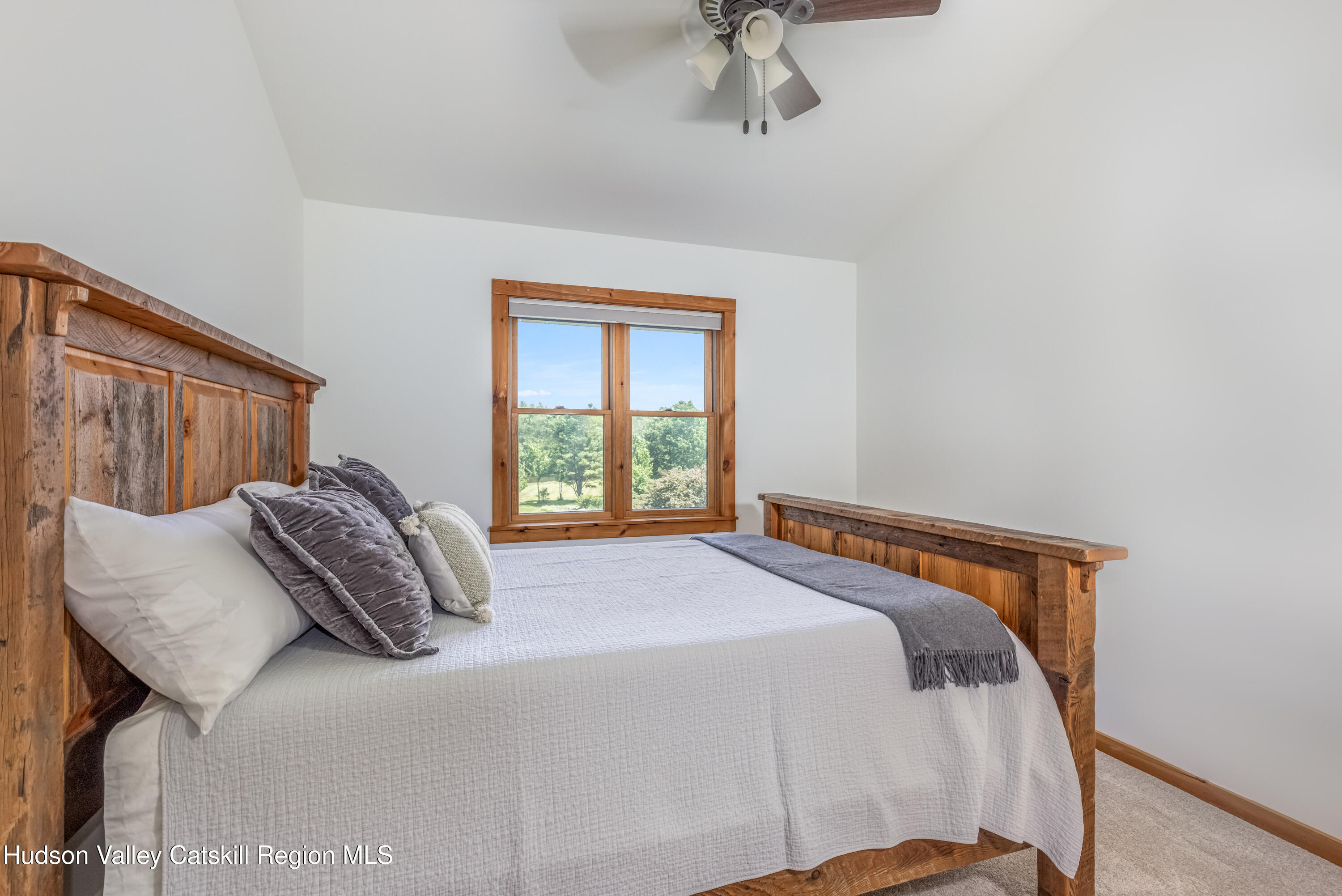 688 Bruce Porn Road Gilboa, NY 12167 - Photo 82 of 104 a bedroom with a bed and a window