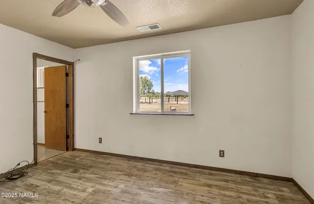 an empty room with windows