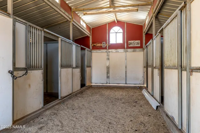a view of a hallway with a window