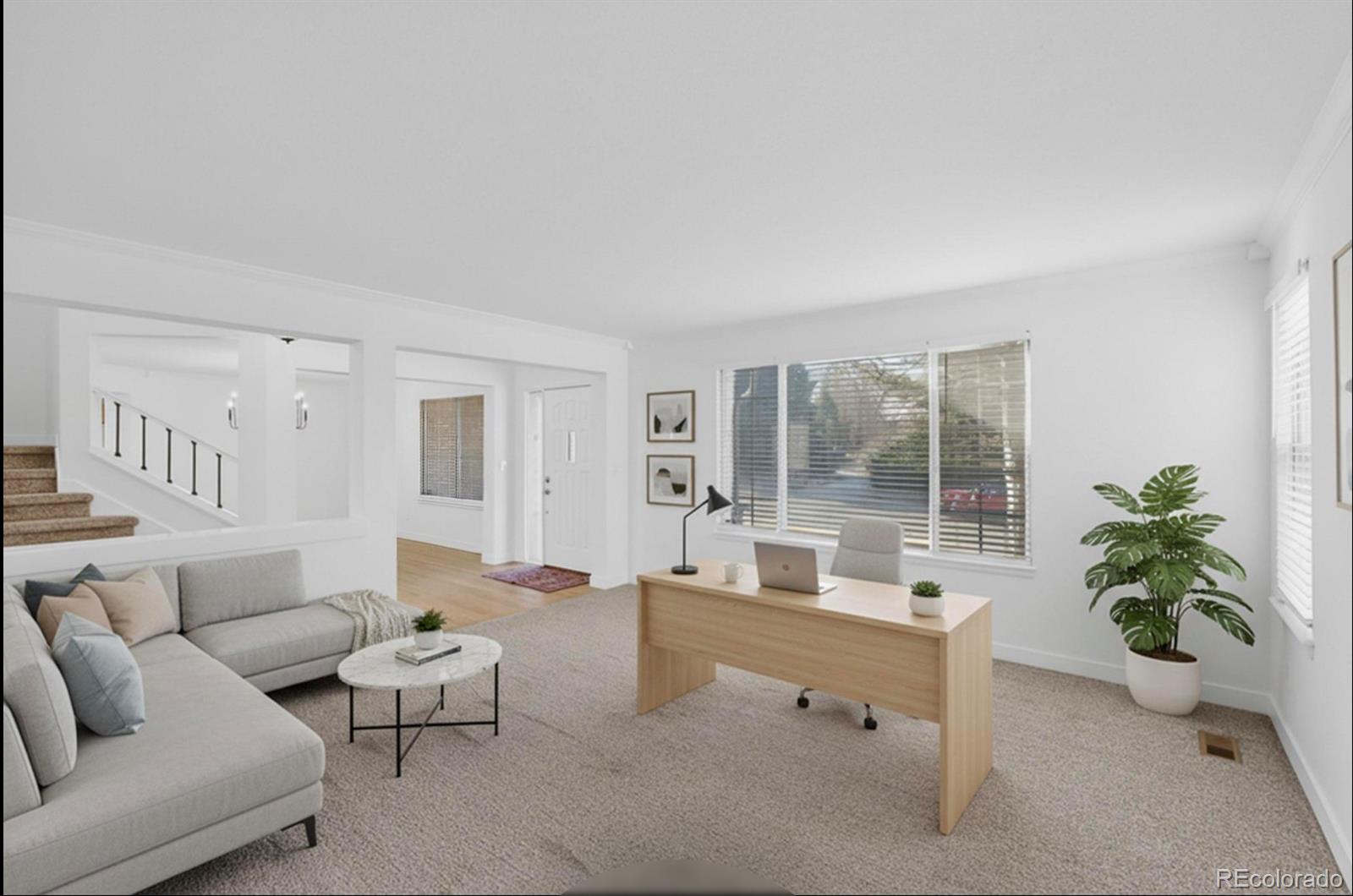 9195 Sugarstone Circle Highlands Ranch, CO 80130 - Photo 11 of 37 a living room with furniture and potted plant