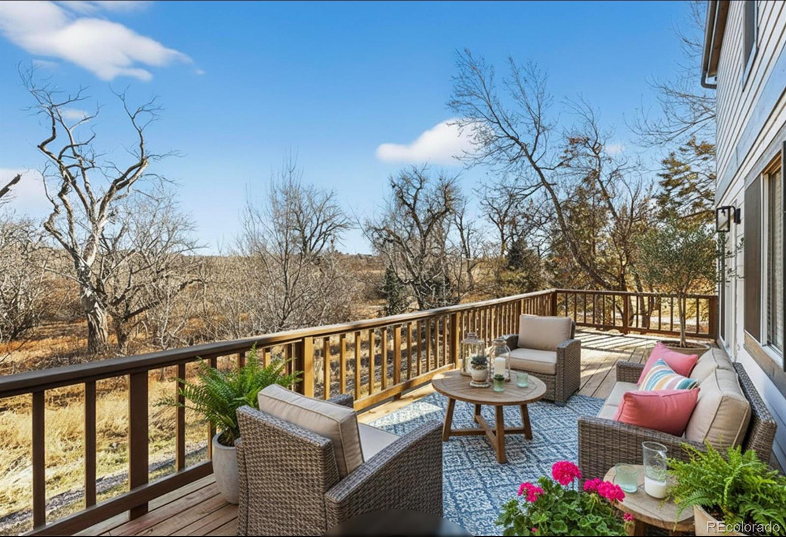 9195 Sugarstone Circle Highlands Ranch, CO 80130 - Photo 18 of 37 a view of a chairs and table in the balcony