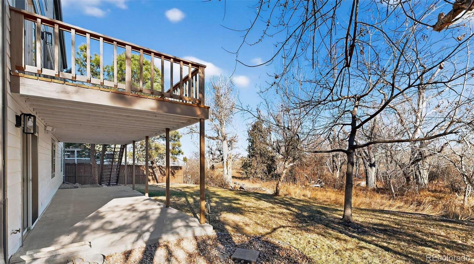 9195 Sugarstone Circle Highlands Ranch, CO 80130 - Photo 20 of 37 a view of wooden balcony