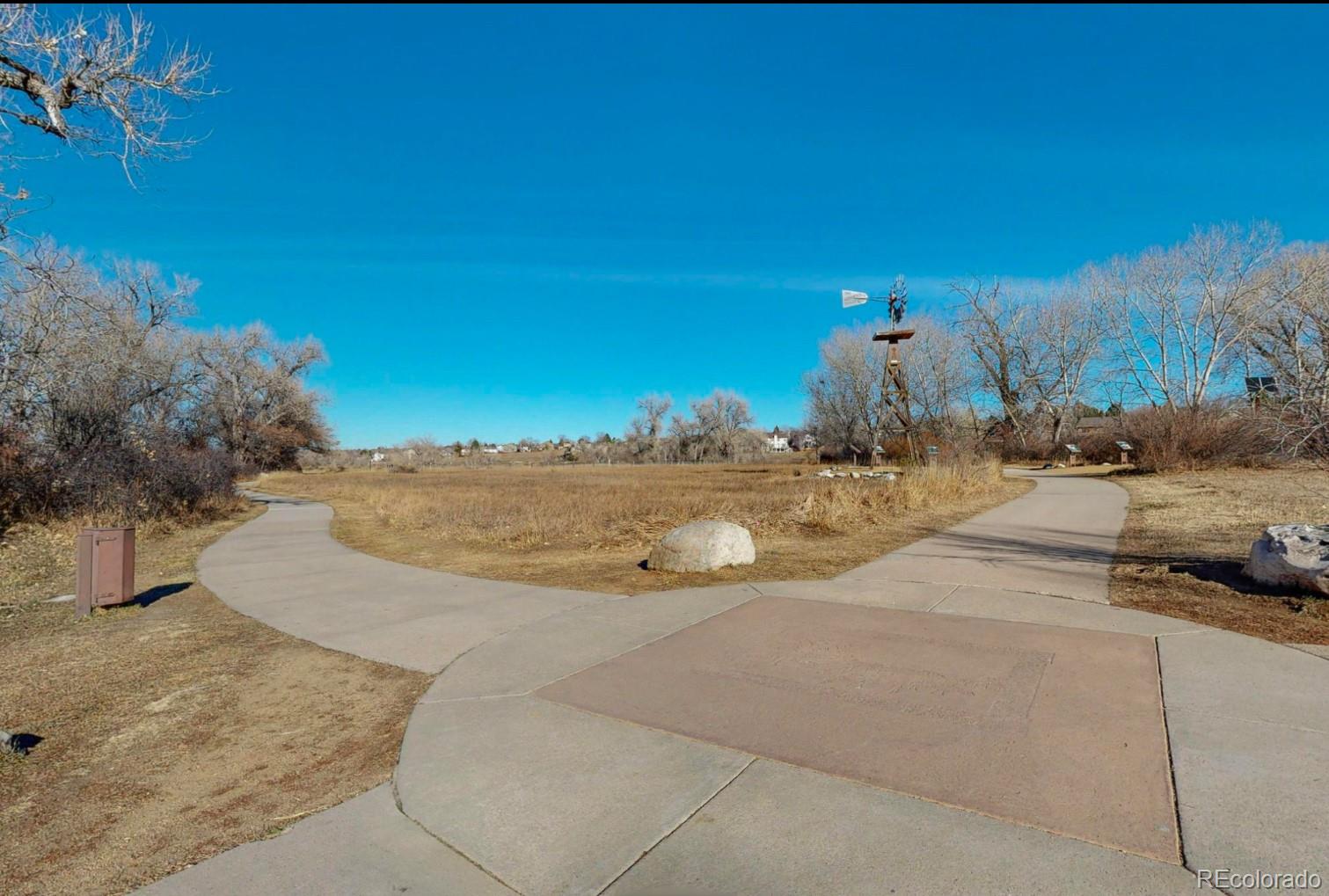 9195 Sugarstone Circle Highlands Ranch, CO 80130 - Photo 24 of 37 a view of a backyard of a house