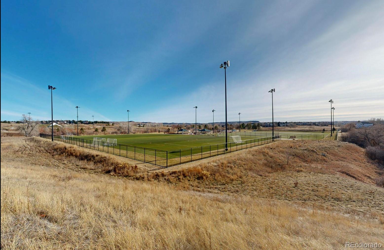 9195 Sugarstone Circle Highlands Ranch, CO 80130 - Photo 28 of 37 a view of a swimming pool
