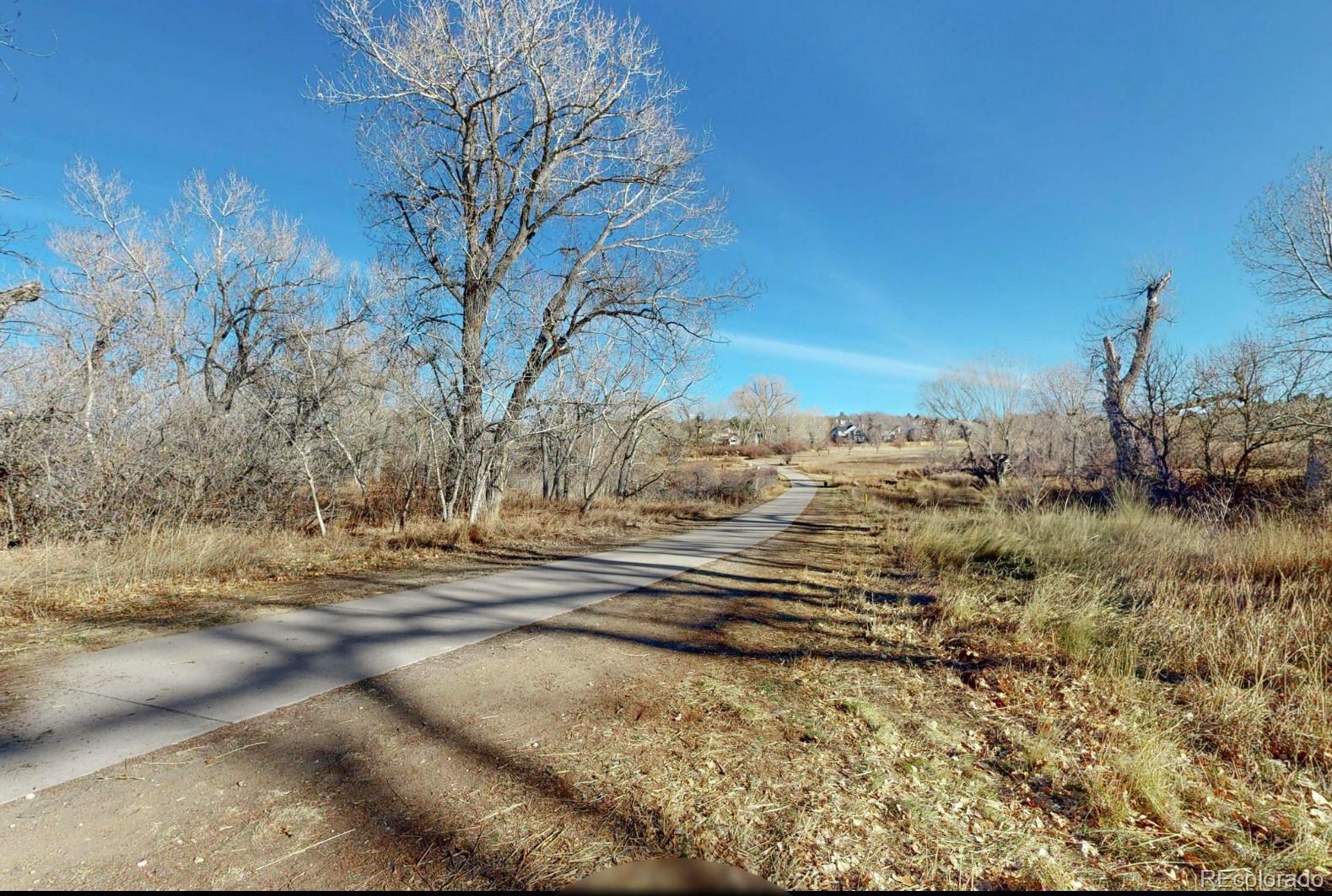 9195 Sugarstone Circle Highlands Ranch, CO 80130 - Photo 33 of 37 a view of a yard of the house