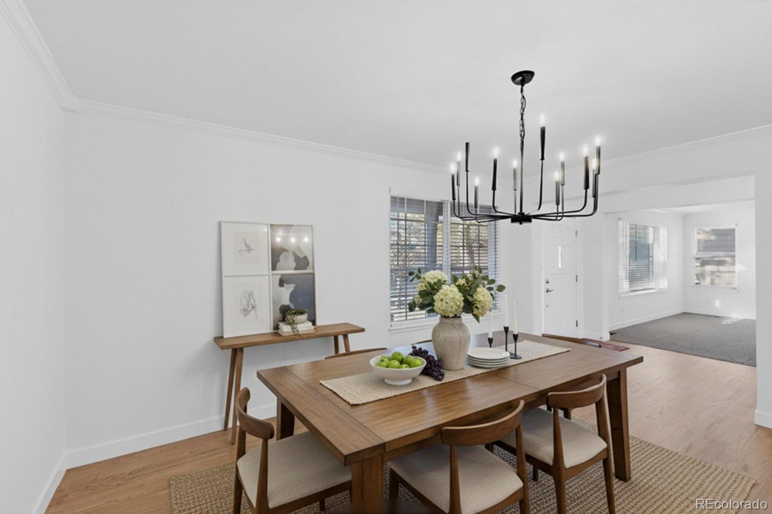 9195 Sugarstone Circle Highlands Ranch, CO 80130 - Photo 9 of 37 a view of a dining room with furniture