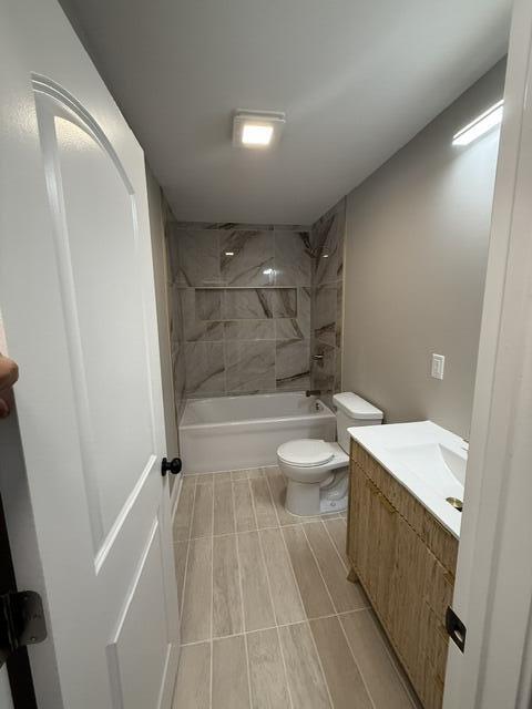 1528 Hanley Street Gary, IN 46406 - Photo 23 of 30 a bathroom with a sink a toilet and shower