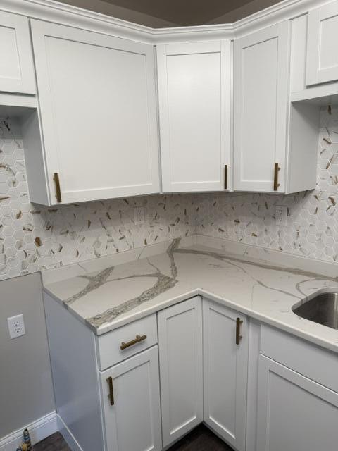 1528 Hanley Street Gary, IN 46406 - Photo 3 of 30 a view of cabinets a sink and dishwasher in a white cabinet