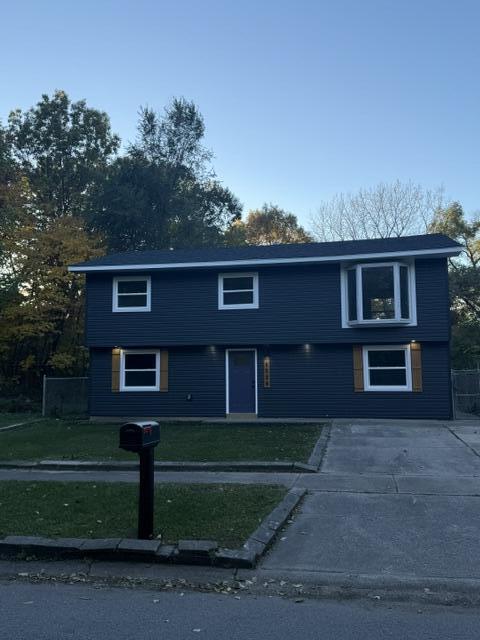 1528 Hanley Street Gary, IN 46406 - Photo 7 of 30 a front view of a house with a yard