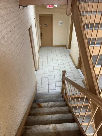 a room with hard wood floors and a sink