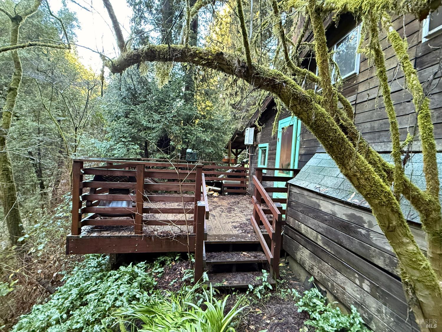 12701 Irmulco Road Willits, CA 95490 - Photo 19 of 24 a view of a wooden chairs in a back yard